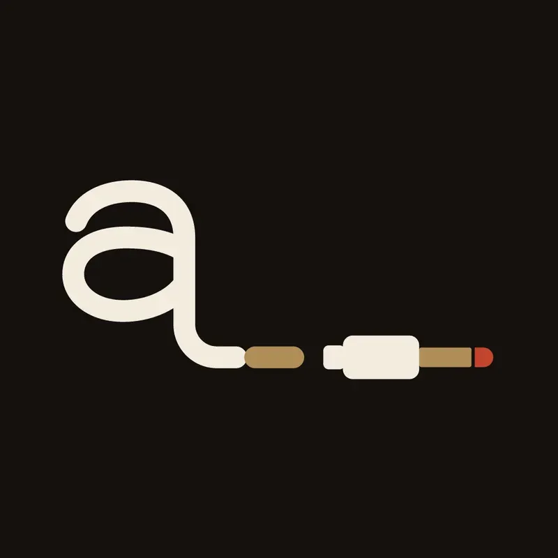 The Aux Affair icon: the lowercase a with its tail flicking into the cable and plug.